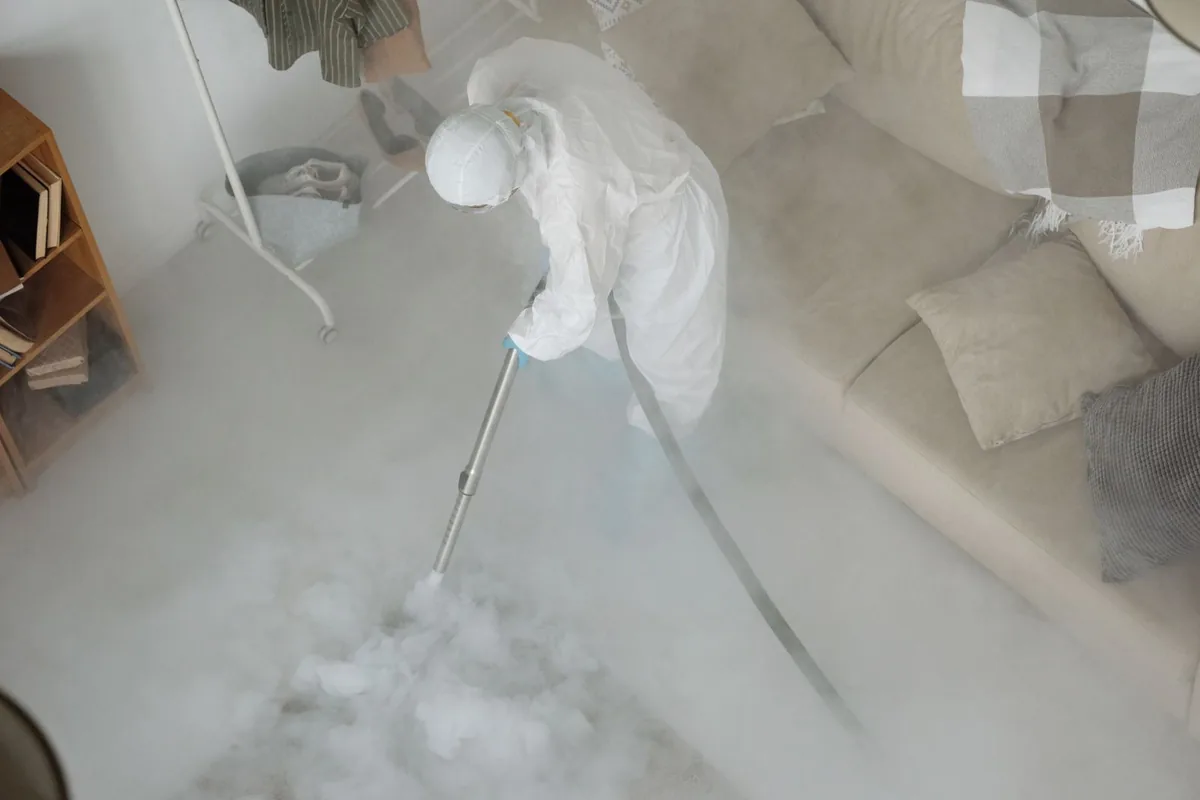 Biohazard cleanup technician in protective equipment, New Market, TN